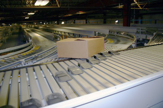 Conveyors and sorters for pallets and cartons